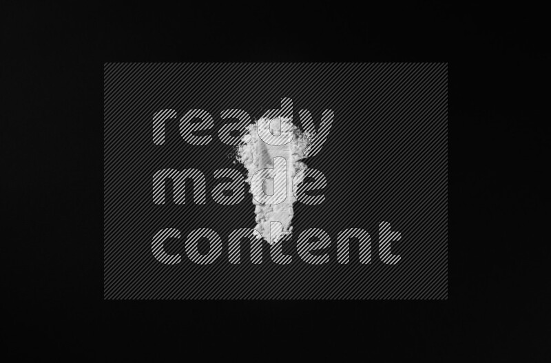 White powder smears on black background