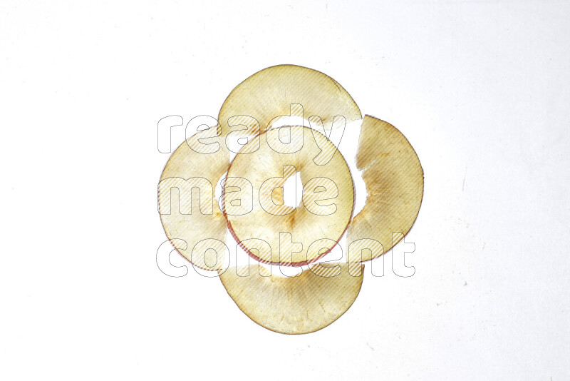 Peach slices on illuminated white background