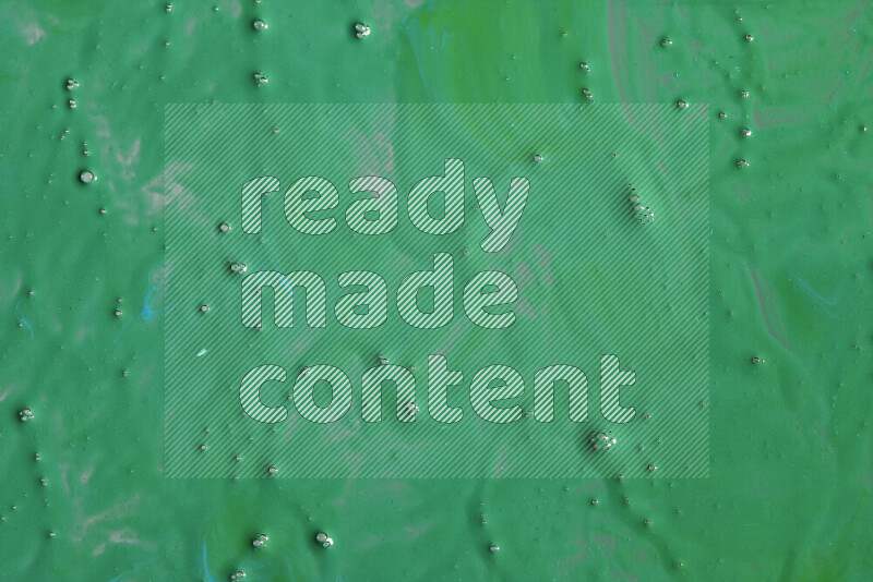 Close-ups of abstract green paint texture in different shapes