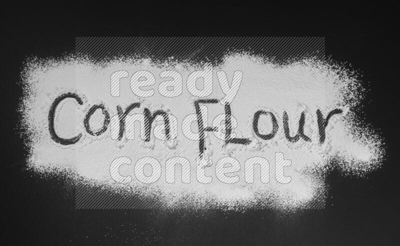 A sentence written with powder on black background
