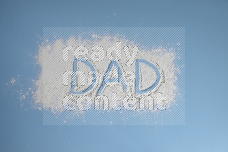 A word written with white powder on blue background