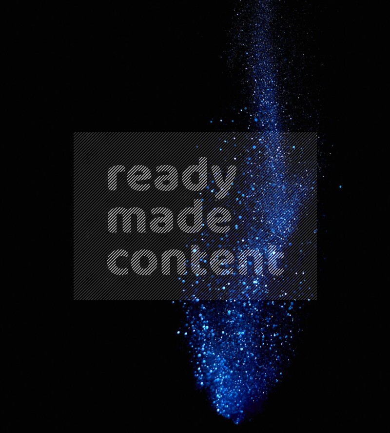 Blue glitter powder isolated on black background