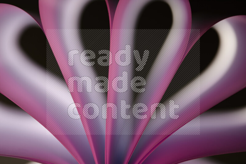 An abstract art piece displaying smooth curves in white and pink gradients created by colored light