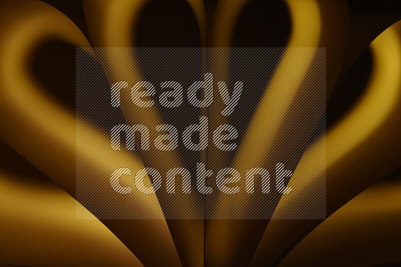 An abstract art piece displaying smooth curves in yellow gradients created by colored light