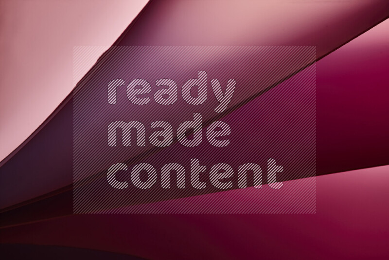 فن تجريدي يعرض منحنيات مع تدرجات الألوان الدافئة والباردة مكونه بضوء ملون