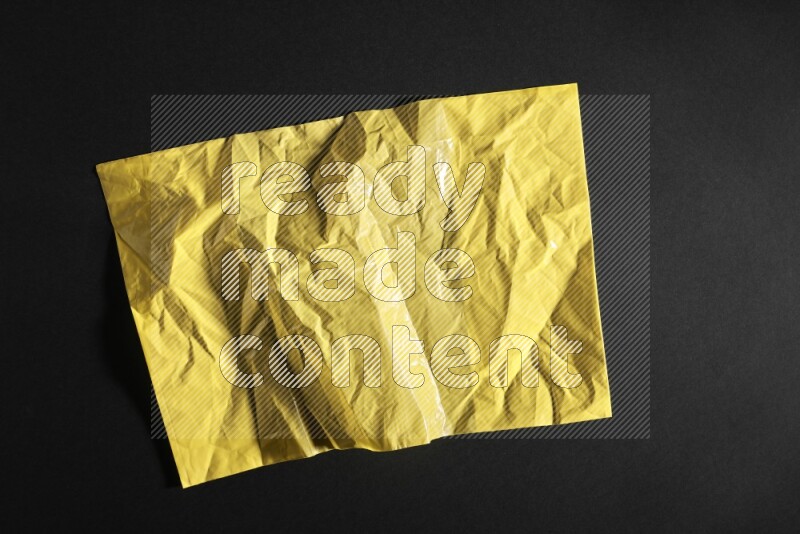 Colored plastic textures on black background