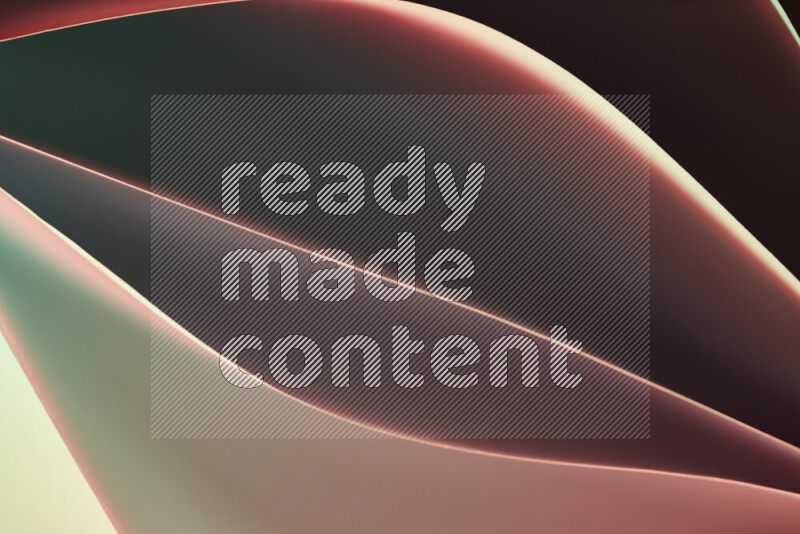 هذه الصورة تعرض تكوين فن الورق التجريدي مع منحنيات ورقية بتدرجات اللون الأخضر والأحمر المكونه بواسطة الضوء الملون