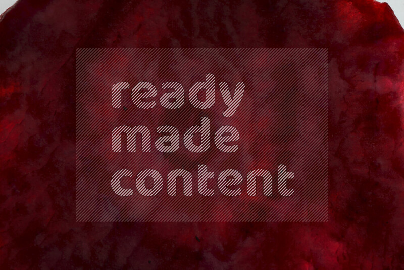 Beet slices on illuminated white background