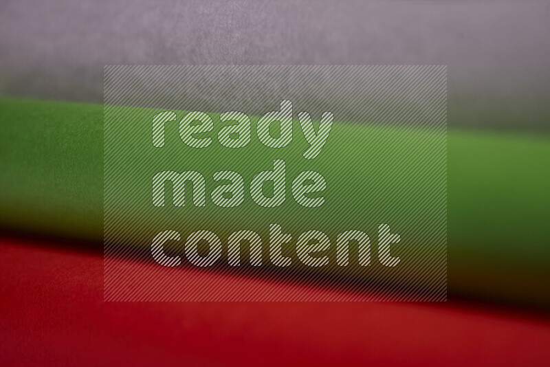 An abstract art showing colorful paper sheets arranged in an overlapping curves