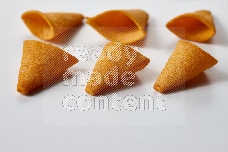Assorted snacks on white background