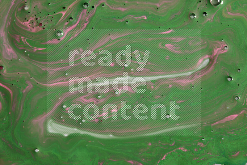 Abstract colorful background with mixed of pink and green paint colors