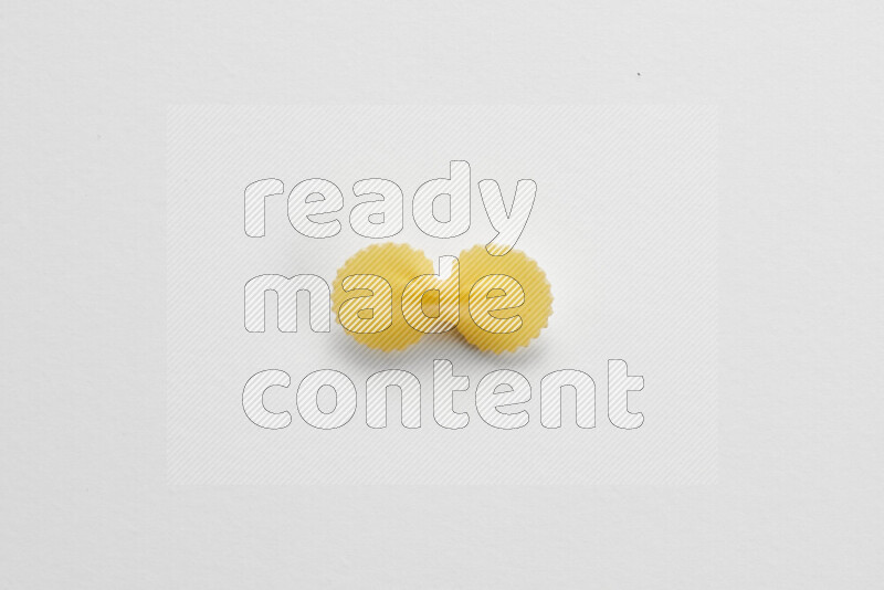 Fiocchi pasta on white background