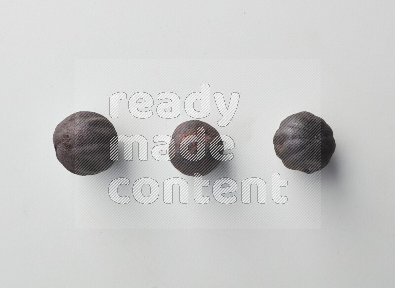 Top-view shot of dried lime (loomi) on white background