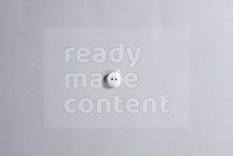 One colored button on grey background