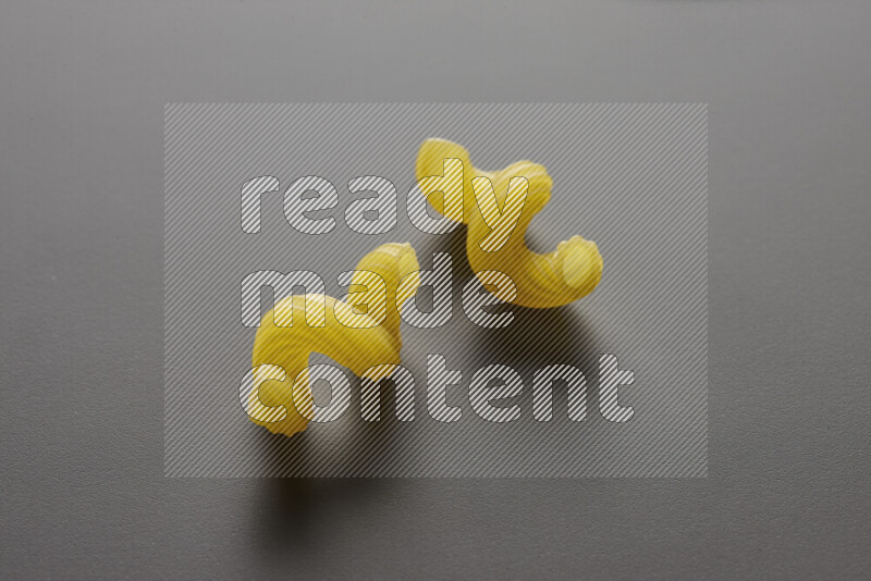 Twist pasta on grey background
