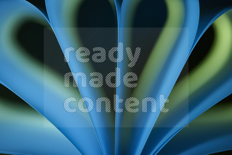 فن تجريدي يعرض منحنيات وتدرجات اللون الأزرق والأخضر مكونه بضوء ملون