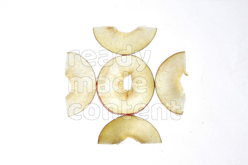 Peach slices on illuminated white background