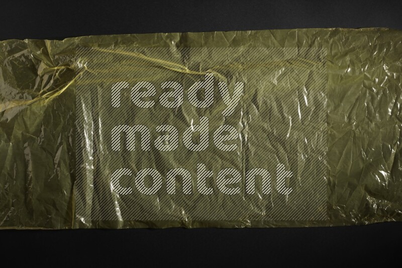 Colored plastic textures on black background