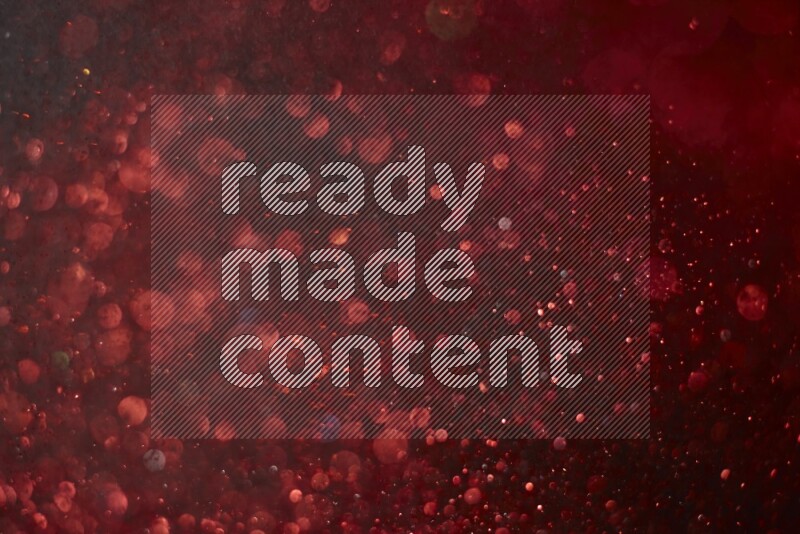 Red glitter powder isolated on black background