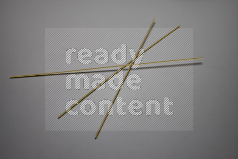 Spaghetti pasta on grey background