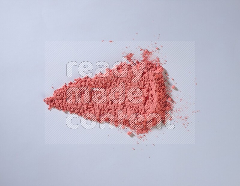 Red powder smears on white background