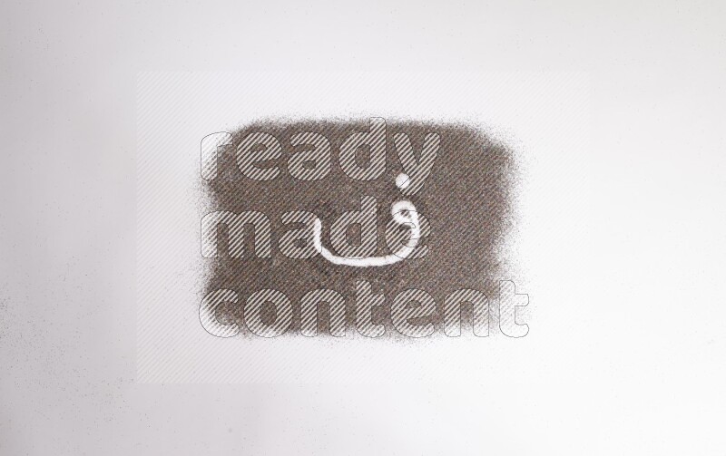 Arabic alphabets written with glitter on white background