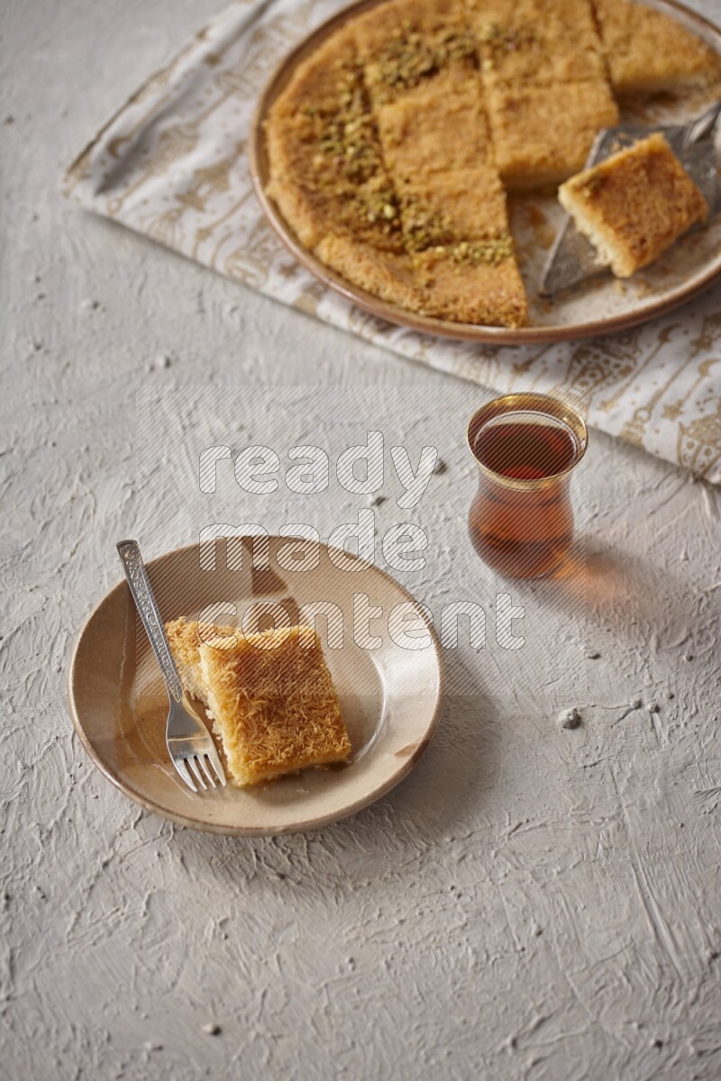 Konafa with tea in a light setup