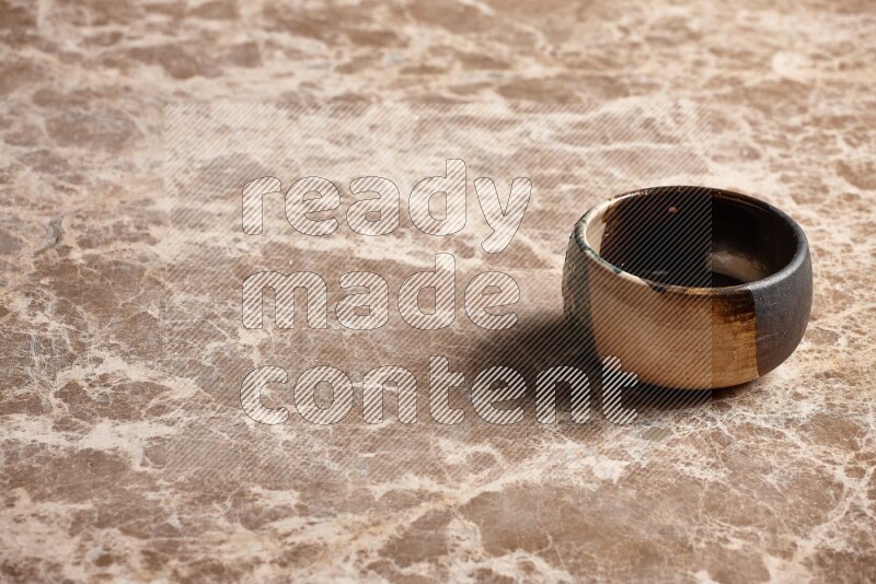Multicolored Pottery Bowl on Beige Marble Flooring