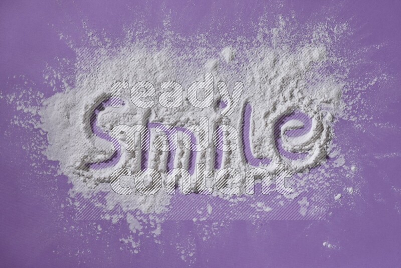 A word written with white powder on purple background