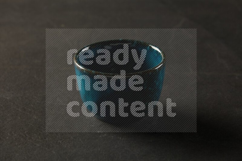 multi color round bowl on grey textured countertop