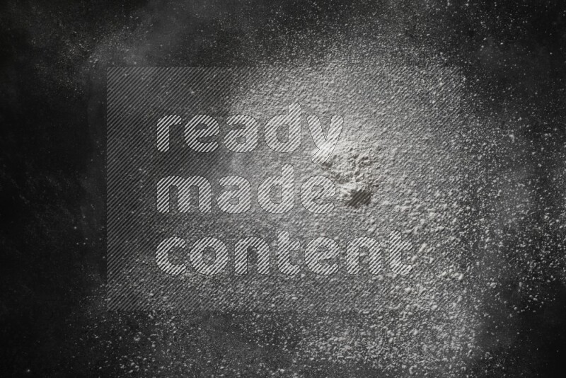 White powder explosion on black background