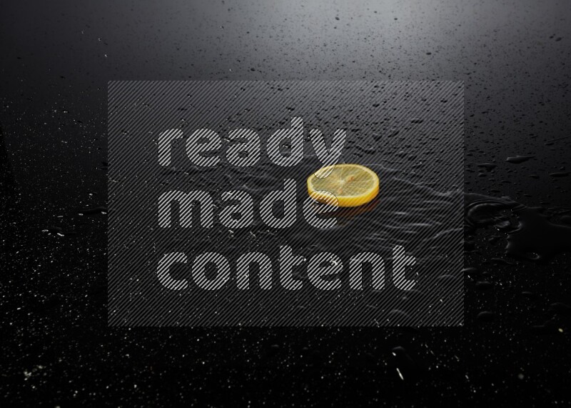 Lemon slice on black background