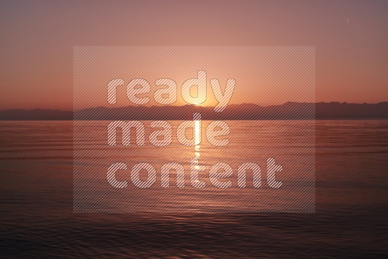 Sunrise over the water