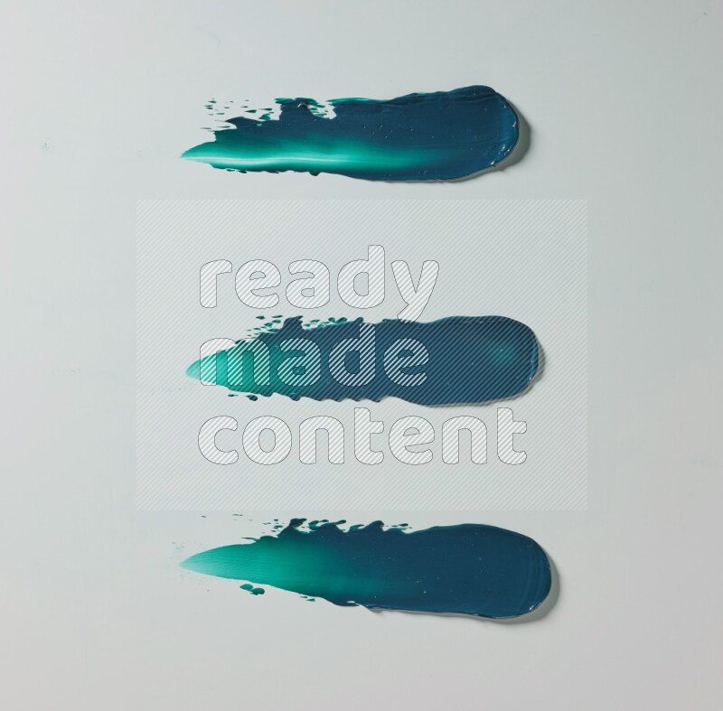 Turquoise painting knife strokes on white background