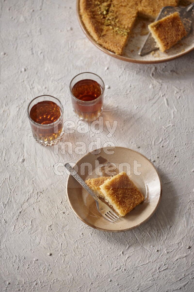 Konafa with tea in a light setup
