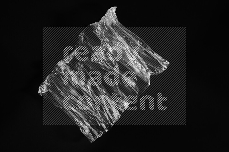 Transparent plastic textures on black background