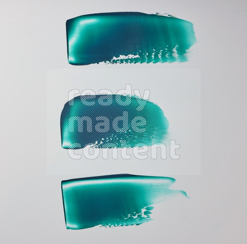 Turquoise painting knife strokes on white background