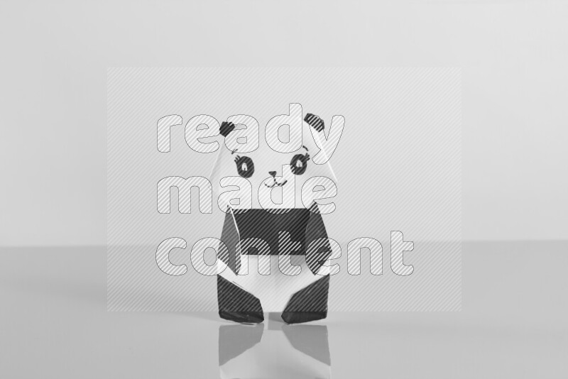 Origami animals on grey background