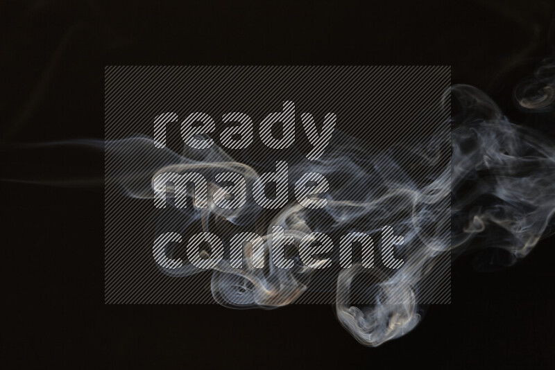 Motion of wavy smoke isolated on dark background