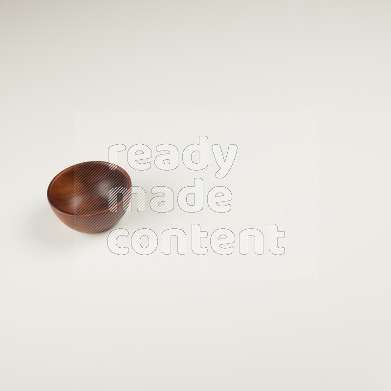Wooden bowl on white background