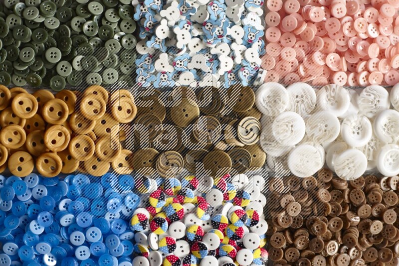 Multicolored buttons placed on grey background