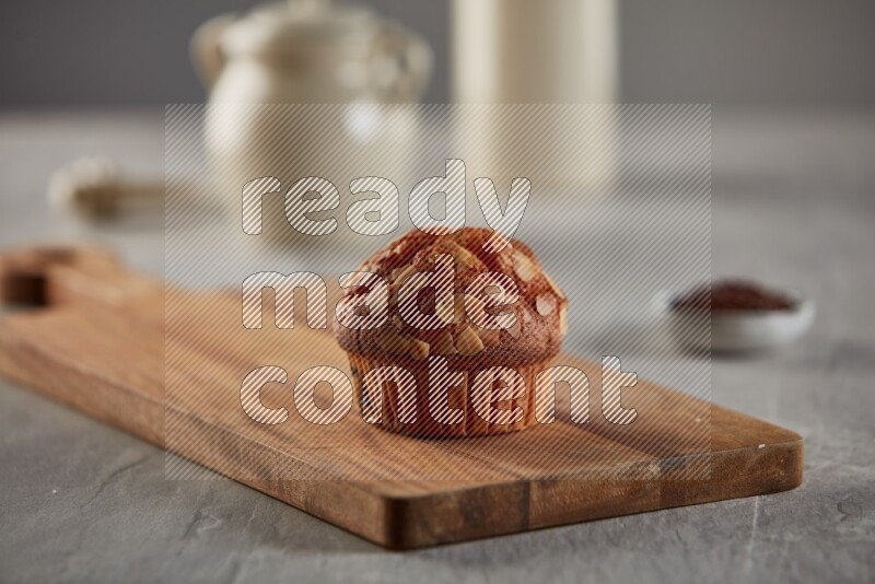 Almond cupcake on a wooden board