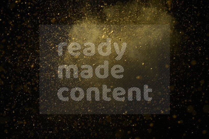 Yellow powder explosion on black background