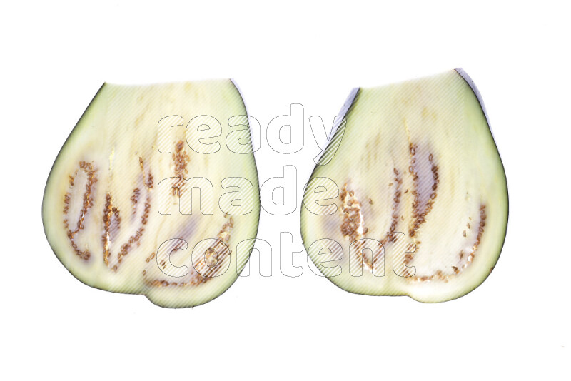 Eggplant slices on illuminated white background