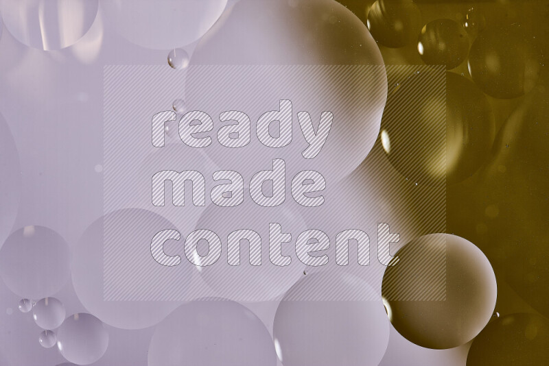 Close-ups of abstract oil bubbles on water surface in shades of white and brown