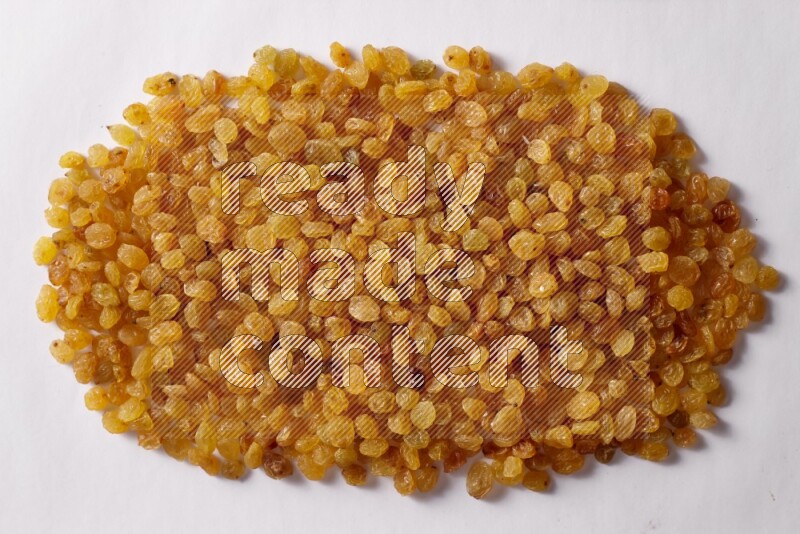 Raisins on white background