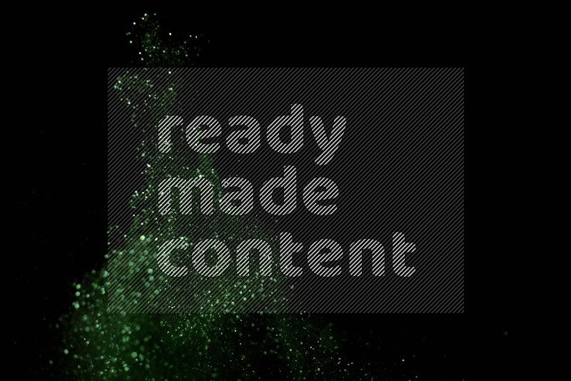 Green glitter powder isolated on black background