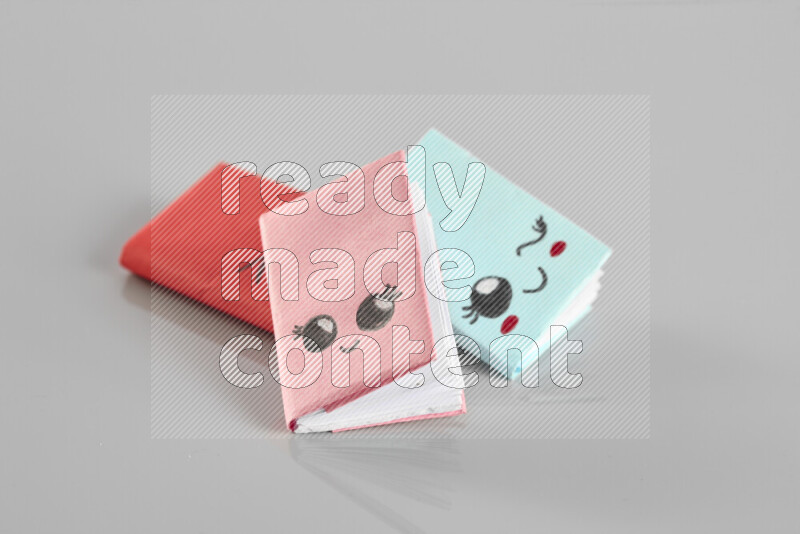 Origami book on grey background
