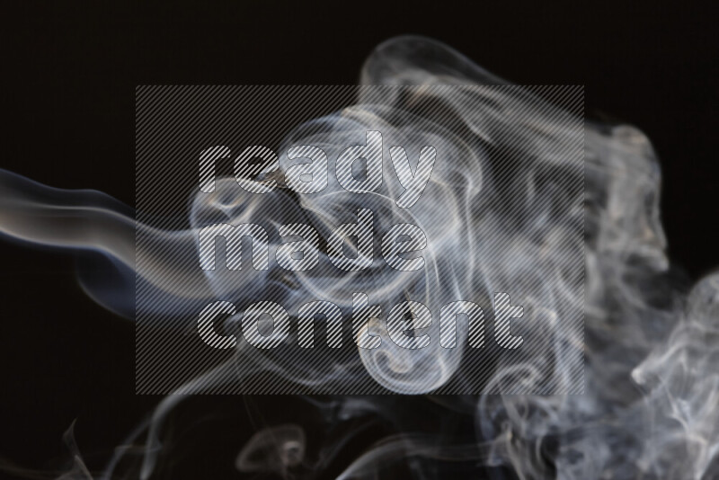 Motion of wavy smoke isolated on dark background