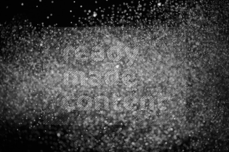 Snow spray on black background